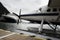 Seaplane and cruise ships docked along the pier in Alaska