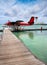 A seaplane at a mooring at ocean