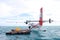 Seaplane next to jetty in sea