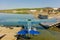 A seaplane tied to a dock at a lake in northern canada