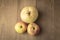 Sear apple and chinese pear on wood background