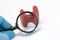 Search disease, abnormalities or pathology of thyroid gland concept photo. Doctor holding magnifying glass and through it examine