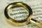 Searching Concept With Closeup Golden Magnifying Glass