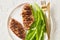 Seared chicken breasts with romaine lettuce leaves