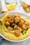 Seared scallops with grits and lemon sauce