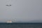 Seascape of aircraft landing and cruise ship arriving to Phu Quoc Island for summer vacation