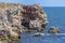 Seascape. Attractive forms of colored rock massifs in Tyulenovo, Northern Black Sea Coast, Bulgaria.