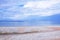 Seascape Beach Covered with Seashells Shore Scenic Landscape Background Wallpaper Stock Photo