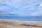 Seascape Beach Covered with Seashells  Shore Scenic Landscape Background Wallpaper Stock Photo