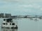 Seascape with bridge and shore with residential houses and harbor