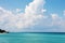 Seascape - bright azure Caribbean Sea and cumulus clouds. Picture taken in Cuba