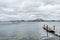 Seascape and buildings at the seashore against cloudy sky in Copenhagen, Danmark