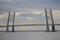 Seascape. Cable-stayed bridge on a background of cloudy sky