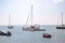 Seascape with catamaran, yachts and boats in