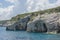 Seascape. Caves in the rocks of the coastline on the island of Zakynthos Greece