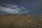 Seascape with cloudy sky and storm coming on the sea