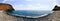 Seascape with coastal volcanic hills and blue wavy water in La Gomera, Canary Islands, Spain.