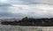 Seascape. The colony of seals  Cape Fur Seals  on the rocky island in the ocean.  Mossel bay. South Africa