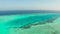 Seascape with coral reef and atoll in the blue sea Balabac, Palawan, Philippines.