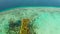 Seascape with coral reef and atoll in the blue sea Balabac, Palawan, Philippines.