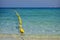 Seascape with floating buoys and rope dividing area on beach. Blue water on sea shore of Al Mamzar Beach Dubai