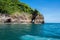 Seascape with the forest cliff and clear sky in the morning