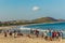 Seascape with group of people,friends,horse riding,mountain background.Rishikonda beach,Visakhapatnam,AP,India,March 05 2017