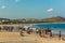 Seascape with group of people,friends,horse riding,mountain background.Rishikonda beach,Visakhapatnam,AP,India,March 05 2017