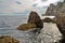 Seascape, huge rocks in the sea and high cliffs on the Black sea