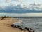 Seascape image of the sea with  stones and grass of light before sunset,  quiet sea