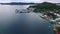 Seascape of Koror island in Palau. Boat and Cityscape, port, pier in Background I