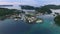 Seascape of Koror island in Palau. Clear Water and Cityscape Meyungs Port Pier in Background