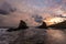 Seascape and magnificent dramatic sunrise over Rock formation The Ships