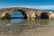 Seascape with medieval bridge in the water at Argassi beach, Zakynthos island