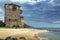 Seascape with Medieval tower in Ouranopoli, Athos, Chalkidiki, Greece