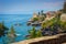 Seascape with the Mediterranean rocky coastline and promenade at Genoa Nervi