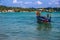 Seascape with motor boat, ceylon, unawatuna