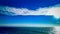 Seascape and mountain landscape on blue sky background in alaska