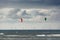 Seascape, North sea by Dutch coast with wind mills and kite surf