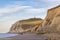 Seascape of the opal coast of Cap Blanc Nez, showing the Monument at Cape white Nose France on top of the chalk cliffs