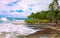 Seascape with picturesque beach and tropical vegetation