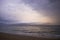 Seascape with Pink and Purple Clouds at Sunset as Hurricane Storm Approaches