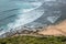 Seascape at Ribeira d`Ilhas beach with blue waves surfers, World Surf Reserve, Ericeira PORTUGAL