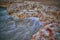 Seascape - Rocks with washing waves at Nightcliff, Northern Territory, Australia