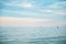 Seascape with sea horizon and blue sky. Background. Painterly seascape scene with relaxing sunset colours