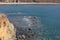 Seascape of the Sea of Japan: transparent blue water, rocky coast in sunny autumn day. Russky island, Tobizina Cape, Vladivostok,