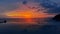 Seascape shot of the beautiful evening red sunset cloudy sky background at Andaman Ocean by the poolside of the villa.