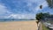 Seascape shot of the beautiful white cloudy blue sky background and beaches at Klong Muang Beach, Krabi, Thailand.