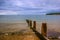 Seascape showing a breakwater and boats