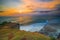 Seascape. Spectacular view from Uluwatu cliff in Bali. Sunset time. Blue hour. Ocean with motion foam waves. Waterscape for